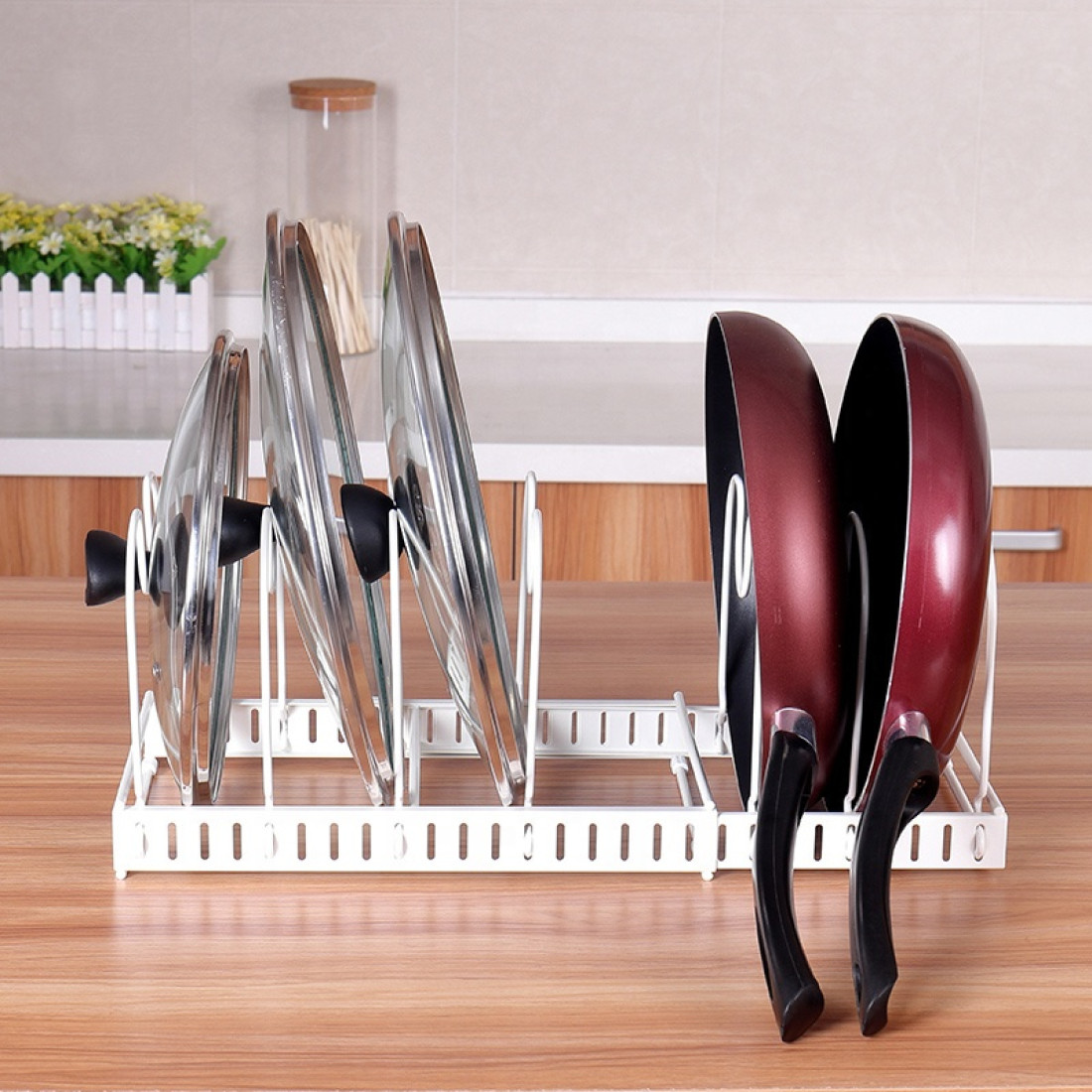 Suport reglabil pentru tigai si capace, 7 separatoare, metalic, 30-57 x 18 x 20 cm Suport reglabil pentru tigai si capace, 7 separatoare, metalic, 30-57 x 18 x 20 cm
